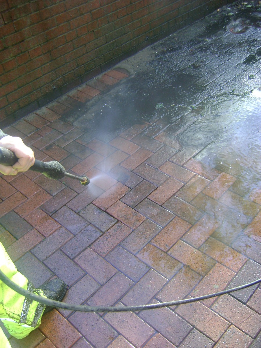 Jet washing floor tiles
