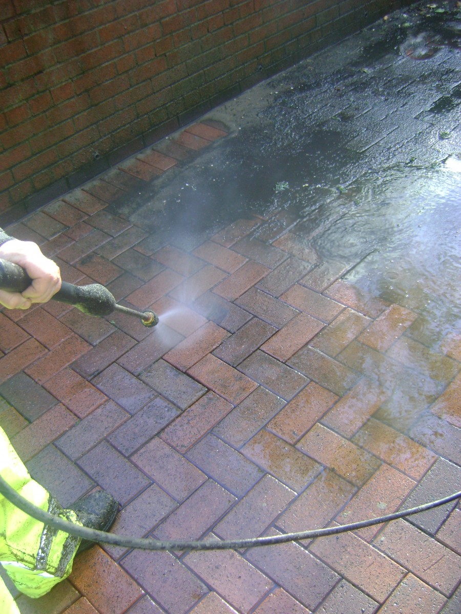 Jet washing floor tiles