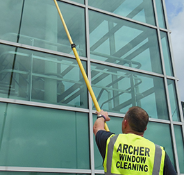 Commercial window cleaners Manchester with Waterfed pole system